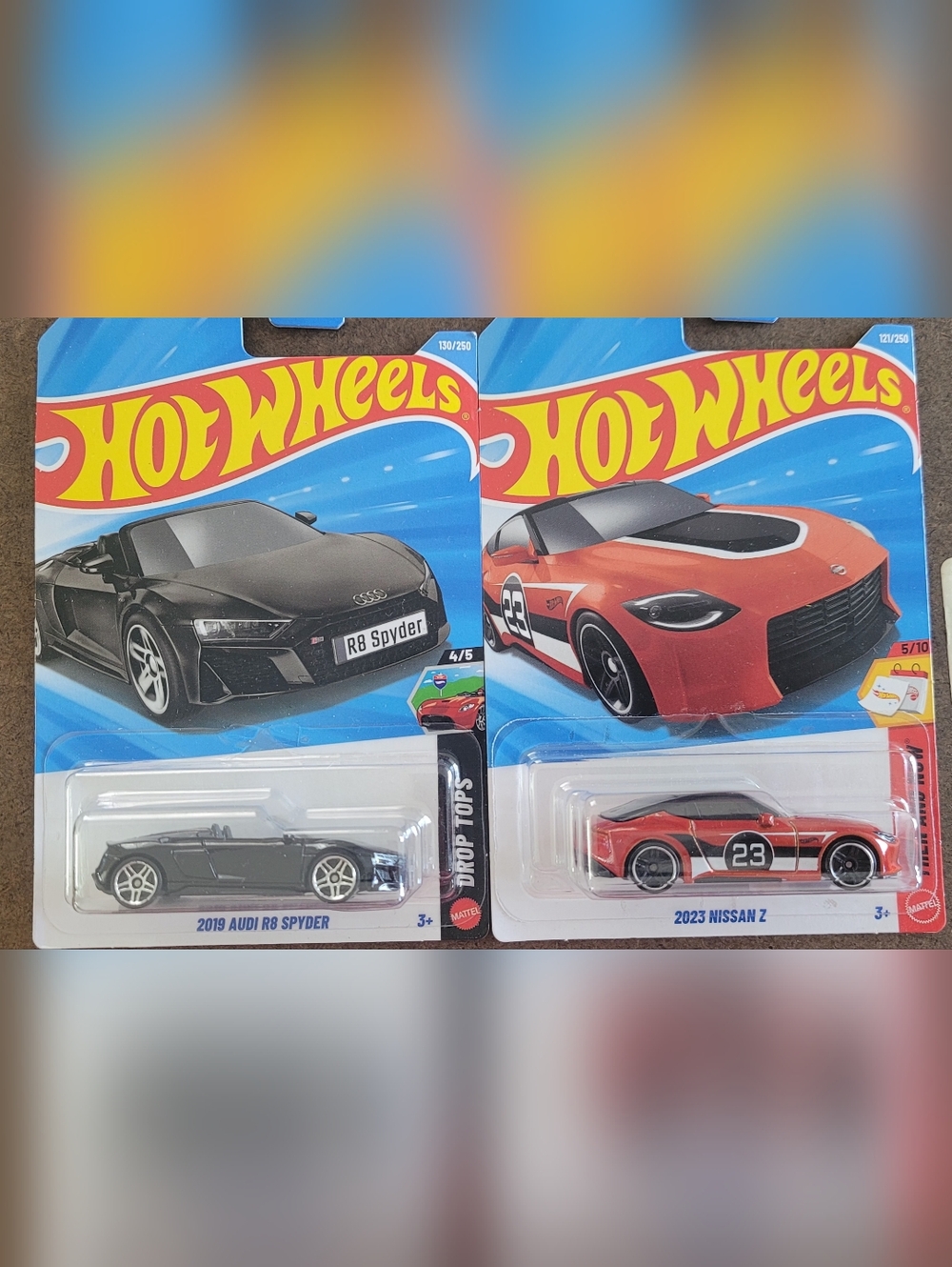 Mattel Hot Wheels Black Audi R8 Spyder & Orange Nissan Z 2023. Bundle of two .